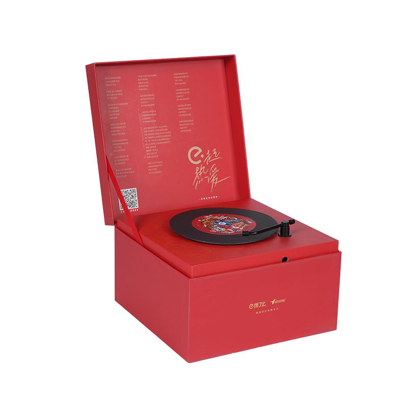 Twarda, obrotowa pozytywka w kształcie książki z motywem świątecznym