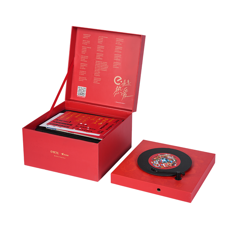 Twarda, obrotowa pozytywka w kształcie książki z motywem świątecznym